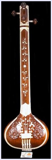 The Tanpura (or tambura, tanpuri) is a long-necked plucked string instrument found in various forms in Indian music. It does not play melody but rather supports and sustains the melody of another instrument or singer by providing a continuous harmonic bourdon or drone.